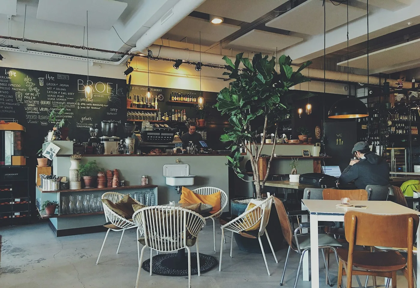 A sunlit café, one of the everyday spaces indoor advertising can be part of